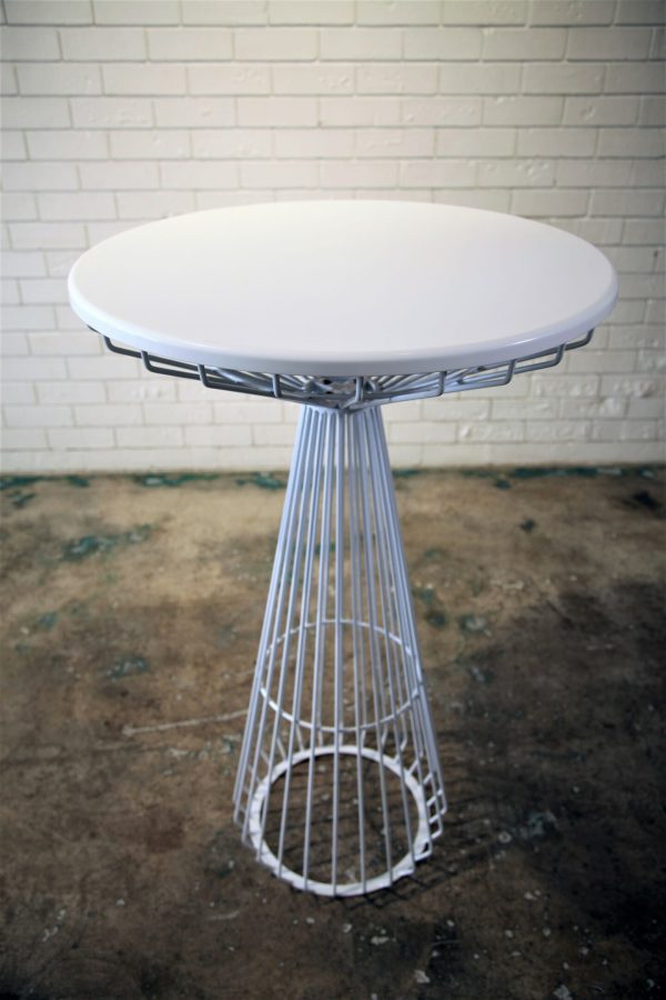 WHITE COCKTAIL TABLE 1_resized Stylish white table with a metal frame and a pristine white surface, great for your next event.