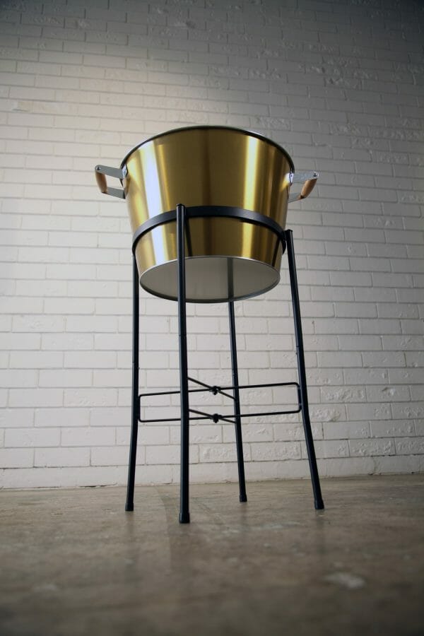 GOLD ICE BUCKETS - BLACK STAND 02_resized A sophisticated golden champagne bucket on a black stand, perfect for your special event or party.