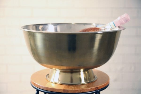 GOLD ICE BUCKETS - MEDIUM 01_resized A large golden metal bowl, perfect for chilling drinks at your next party, wedding, or engagement celebration.