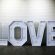 A large sign reading "LOVE" that can be illuminated, perfect for events, available for hire from RSVP Event Hire in Perth.
