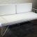 Elegant white couch featuring metal legs and a white cushion, ideal for any event, offered for hire by RSVP Event Hire in Perth.