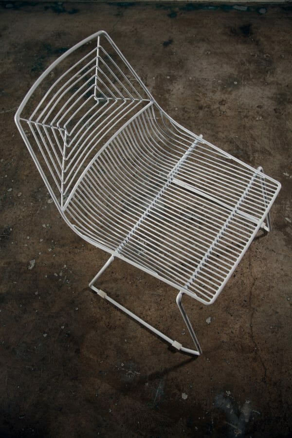 WHITE WIRE DINING CHAIR 04_resize Elegant white chair featuring a metal frame and plush white cushion, ideal for dining or lounging available from RSVP Event Hire in Perth.