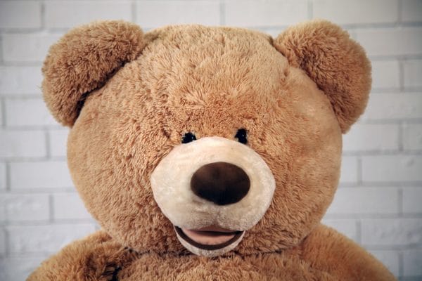 GIANT TEDDY BEAR A smiling giant teddy bear, perfect for adding fun to your event, available for hire from RSVP Event Hire.