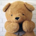 A giant teddy bear, perfect for adding fun to your event, available for hire from RSVP Event Hire.