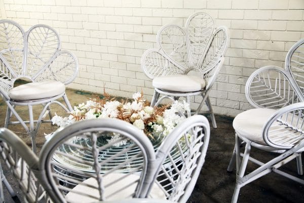 PEACOCK SETTING 05_resize Charming white wicker round table and chairs set, available for hire from RSVP Event Hire in Perth for your special events.