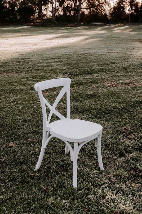 White-childrens-cross-back-chairs-for-hire-Kids-party-hire-WA-Perth White chairs available for your One's occasion from RSVP Event Hire in Perth.